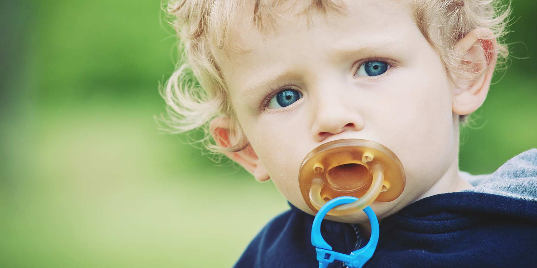 Child with a Pacifier