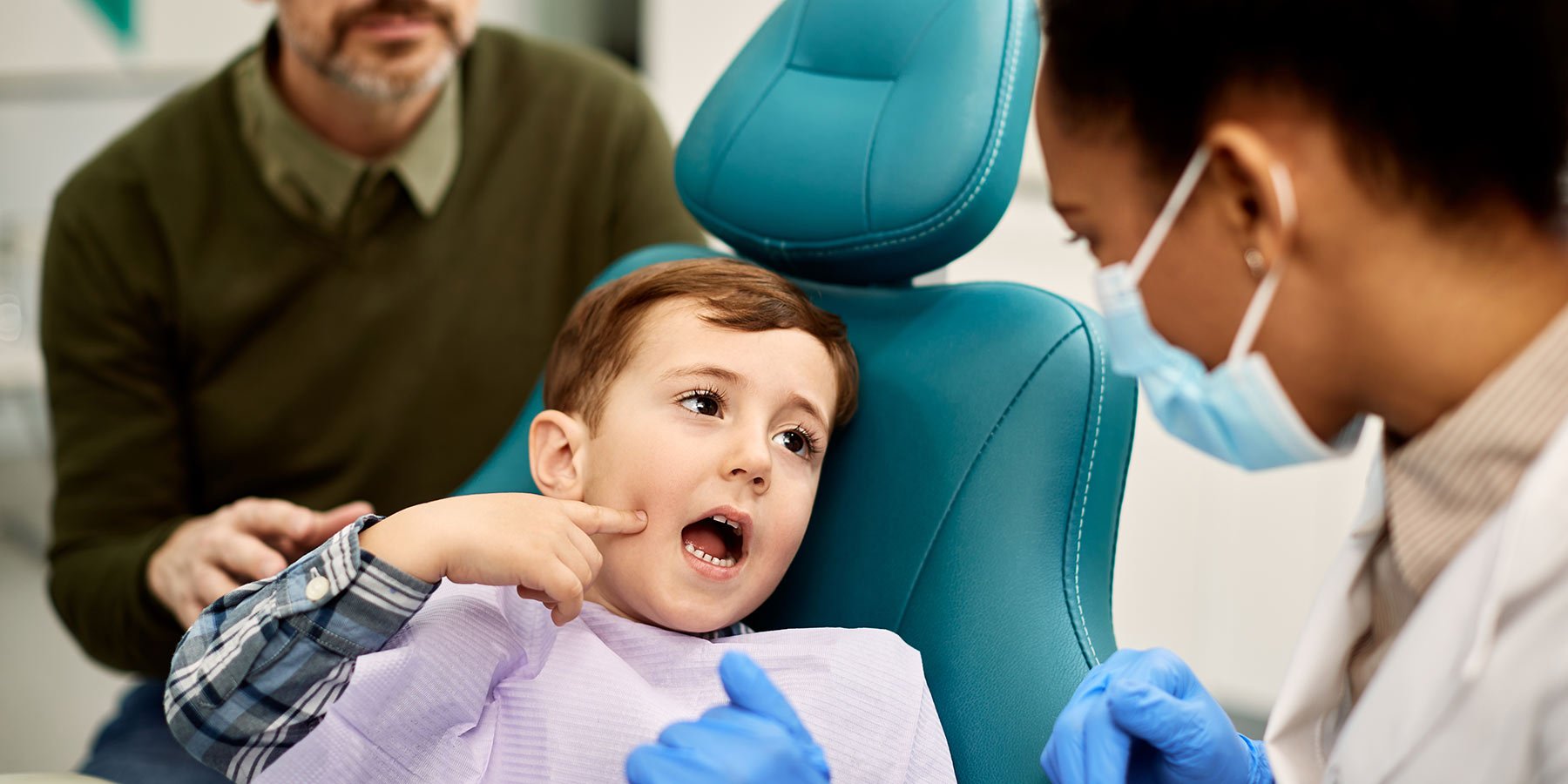 Child Pointing at a Tooth